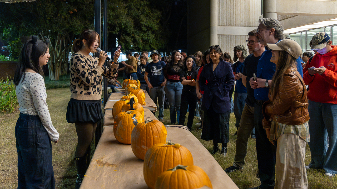 Students present their Jack-o-lanterns to the judges.