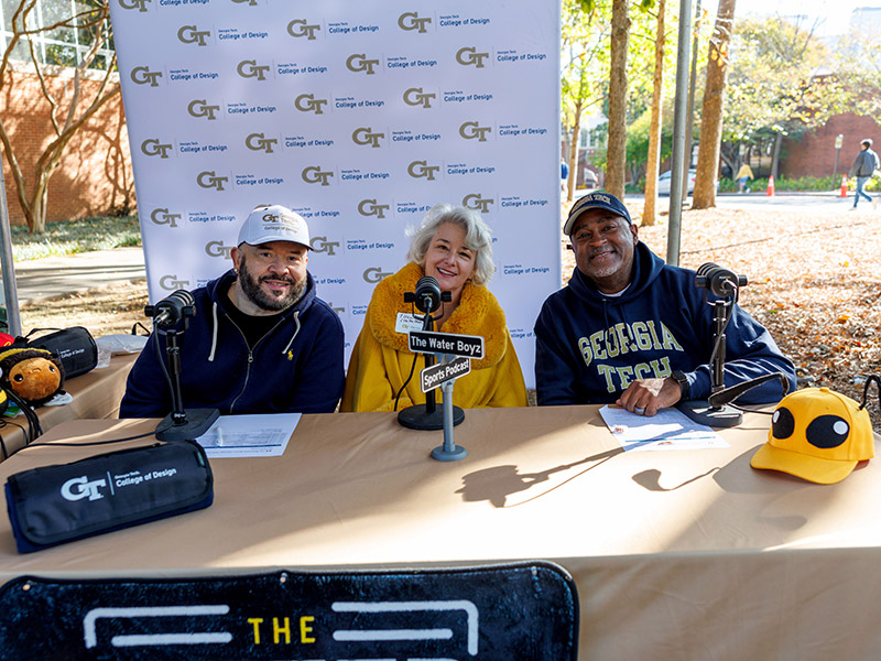 Dean Ellen Bassett, center, and the Water Boyz podcast
